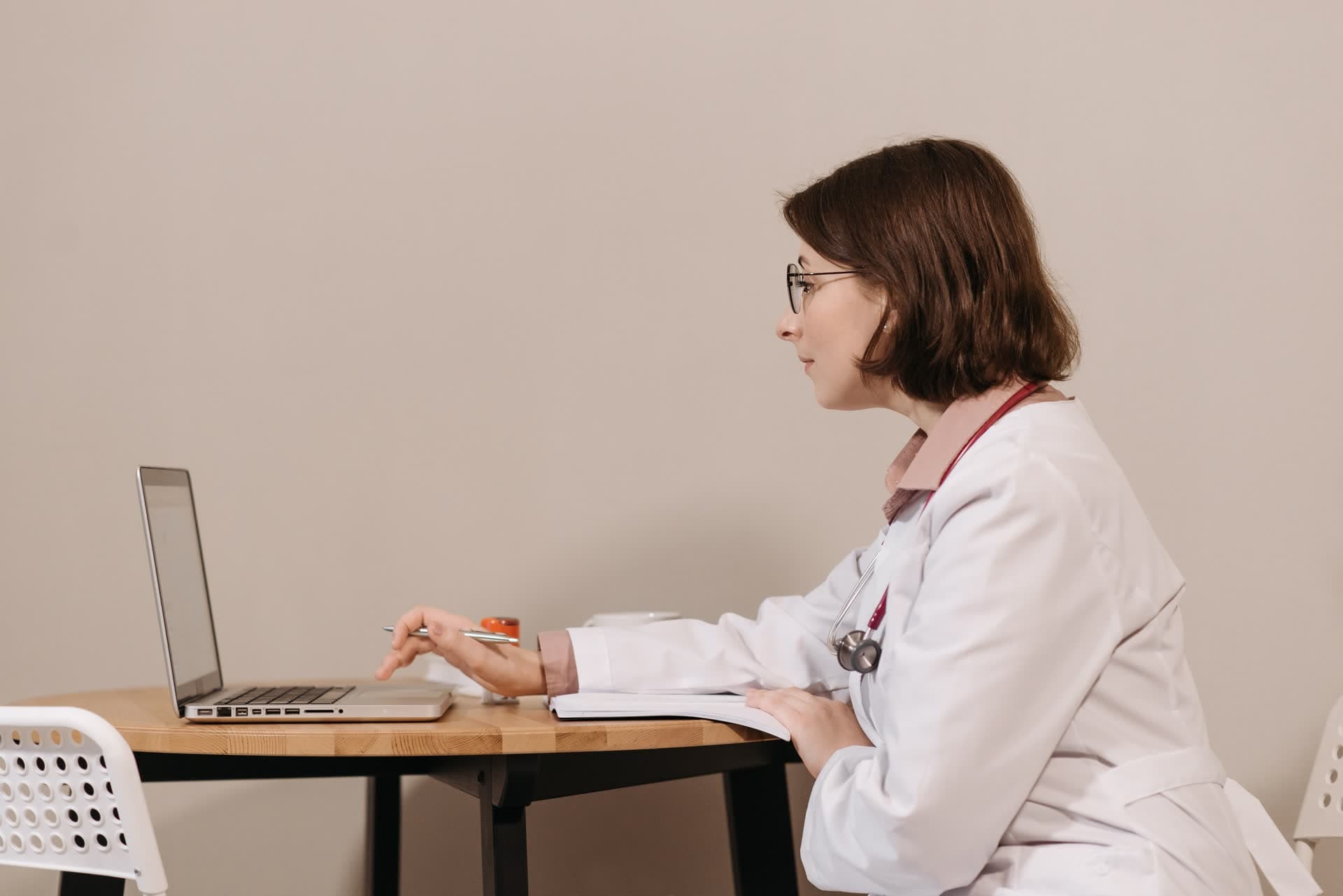 Physician processing a patient certification online